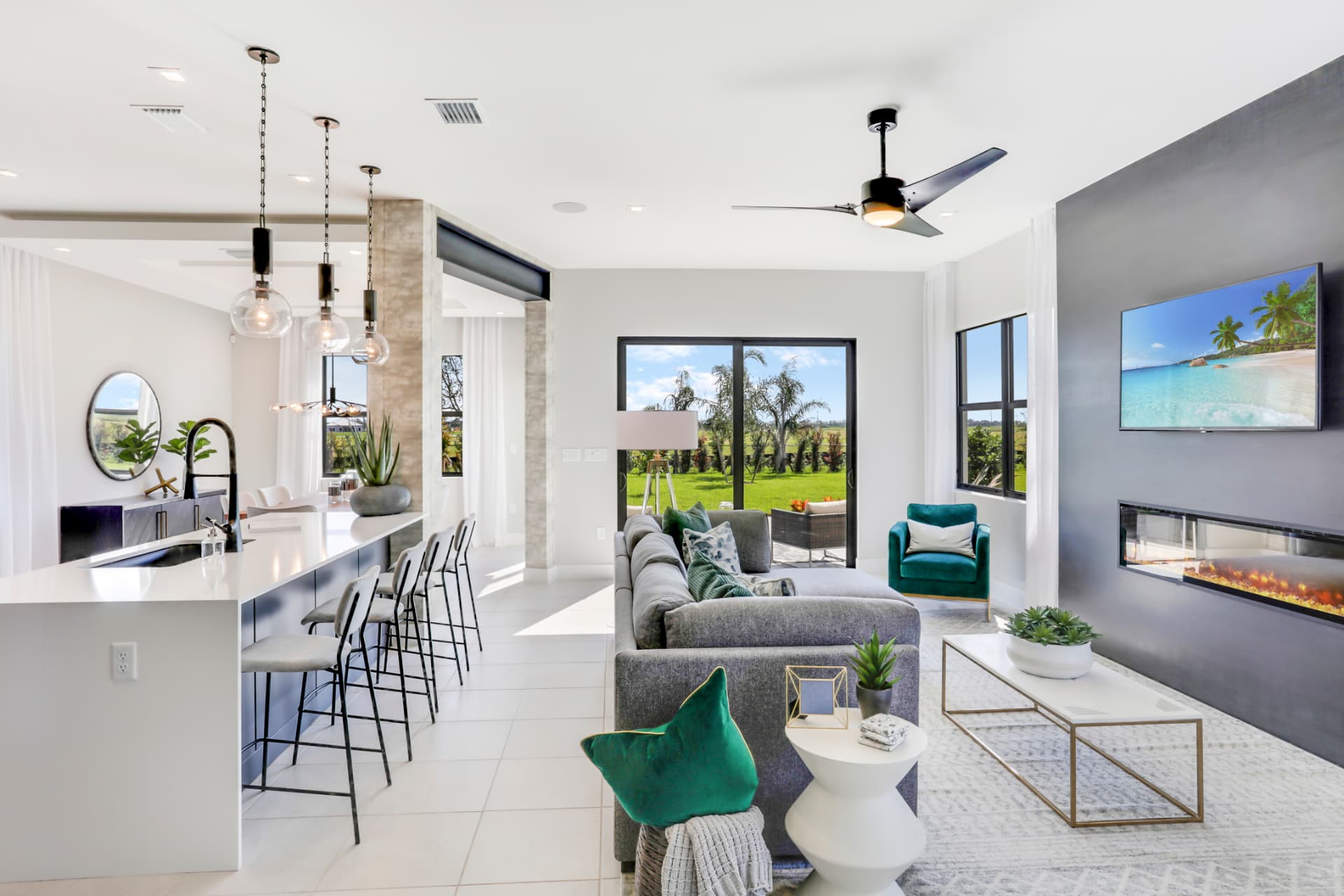 Open-plan living and dining space in a bright new-construction Florida home